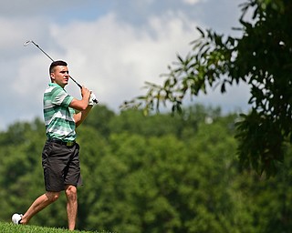 HOWLAND, OHIO - AUGUST 18, 2018: Dan Diloreto of Struthers watches his approach shot on the ninth hole, Saturday afternoon during the Vindy Greatest Golfer at Avalon Lakes. DAVID DERMER | THE VINDICATOR