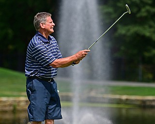 HOWLAND, OHIO - AUGUST 18, 2018: Bob Tinney of Poland reacts after missing a putt on the ninth hole, Saturday afternoon during the Vindy Greatest Golfer at Avalon Lakes. DAVID DERMER | THE VINDICATOR