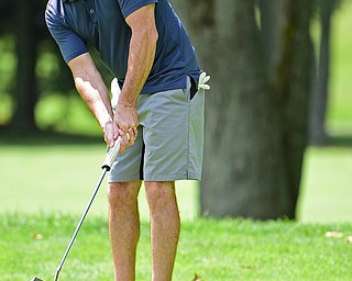 HOWLAND, OHIO - AUGUST 18, 2018: Jim Gaca of Canfield watches his putt on the sixth hole, Saturday afternoon during the Vindy Greatest Golfer at Avalon Lakes. DAVID DERMER | THE VINDICATOR