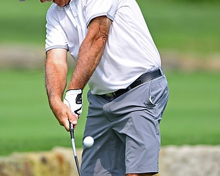 POLAND, OHIO - AUGUST 19, 2018: Ed Seeco, of Boardman, watches his tee shot on the ninth hole during the final round of the Vindy Greatest Golfer, Sunday afternoon at the Lake Club. DAVID DERMER | THE VINDICATOR