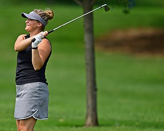 POLAND, OHIO - AUGUST 19, 2018: Angela Molaskey, of Poland, watches her approach shot on the eighth hole during the final round of the Vindy Greatest Golfer, Sunday afternoon at the Lake Club. DAVID DERMER | THE VINDICATOR