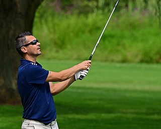 POLAND, OHIO - AUGUST 19, 2018: Brian Newell, of Hubbard, watches his approach on the seventh hole during the final round of the Vindy Greatest Golfer, Sunday afternoon at the Lake Club. DAVID DERMER | THE VINDICATOR