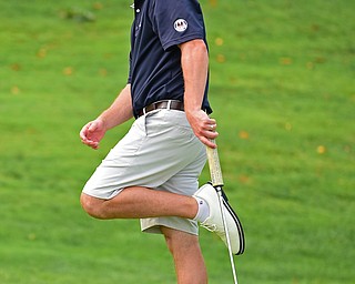 POLAND, OHIO - AUGUST 19, 2018: Jonah Karzmer, of Poland, reacts after missing a putt on the ninth hole during the final round of the Vindy Greatest Golfer, Sunday afternoon at the Lake Club. DAVID DERMER | THE VINDICATOR