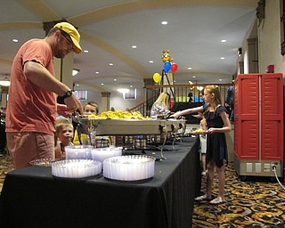 Neighbors | Jessica Harker.The library provided free breakfast for children who completed the summer reading program and their families at Stambaugh Auditorium.