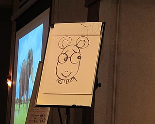 Neighbors | Jessica Harker.Author and illustrator Marc Brown quickly sketched his famous character, Arthur, for the crowd gathered at Stambaugh auditorium.