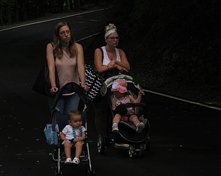 Neighbors | Jessica Harker.Tara Calco, pushing her daughter Theresa, walked along side Danielle Tenney, pushing Camryn Porter, during the Trot With Your Tot event in Mill Creek Park on July 31.