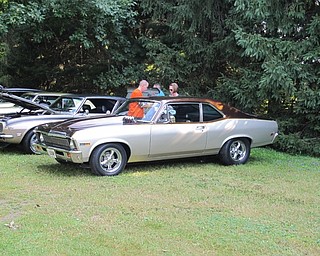 Neighbors | Jessica Harker.Spectors looked at cars that were on display at the 40th annual MVOCC "Cars in the Park" car show on Aug. 4 in Boardman.