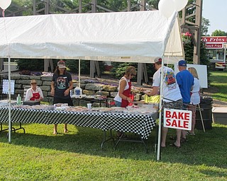 Neighbors | Jessica Harker.The MVOCC hosted a bake sale during their annual car show on Aug. 5 at Boardman Park.