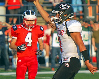 William D. Leiws The Vindicator  Girard's Mark Waid(7) scores  during first quarter action8-23-18 action at Niles. Niles(4)Trent Johnson is in background.