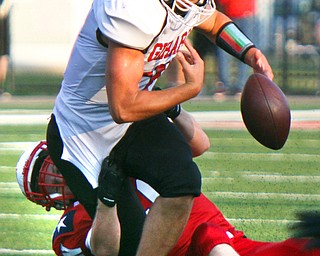 William D. Leiws The Vindicator  Girard's Mark Waid(7) fumbles after being hit by Niles David May(33) during 8-23-18 action at Niles.
