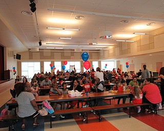 Neighbors | Jessica Harker.Students and their families gathered for lunch to celebrate the completion of the Success by 6 program.
