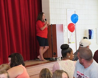 Neighbors | Jessica Harker.Kristina Warga addressed the students and their parents gathered at the closing ceremony to Austintowns Success by Six program on Aug. 17.