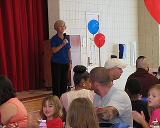 Neighbors | Jessica Harker.Kathy Mock, of the United Way, addressed the crowd, thanking the parents of students and all of the teachers who worked hard during the Austintown Success by 6 program on Aug. 17 at the closing lunch.