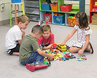 Neighbors | Jessica Harker.Children played in a small group on Aug. 16 during the Success by 6 program at Poland Union Elementary School.