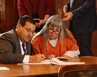 Claudia Hoerig's new attorney, John Cornely, head of the trial division of the Office of the Ohio Public Defender, sat with Hoerig today before her hearing began in Trumbull County Common Pleas Court.