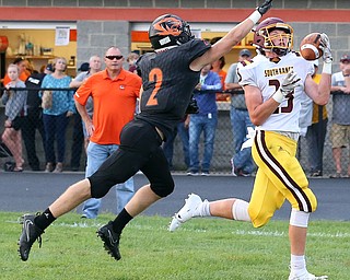NEW MIDDLETOWN SPRINGFIELD, OHIO -August 24, 2018: SOUTH RANGE RAIDERS vs SPRINGFIIELD TIGERS at Tigers Stadium-  South Range Raiders' Chris Brooks (23) makes a one handed TD catch against Middletown Springfield Tigers' Evan Ohlin (2) during the 2nd. qtr.  MICHAEL G. TAYLOR | THE VINDICATOR