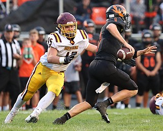 NEW MIDDLETOWN SPRINGFIELD, OHIO -August 24, 2018: SOUTH RANGE RAIDERS vs SPRINGFIIELD TIGERS at Tigers Stadium-  South Range Raiders' Ryan Davenport (45) zeros in on  Middletown Springfield Tigers' Brannon Brungard (8) during the 2nd. qtr.  MICHAEL G. TAYLOR | THE VINDICATOR