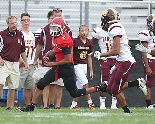 Adrian Brown (6) of Struthers outruns the Liberty defense up the sidelines during Friday nights matchup at Struthers High School. Dustin Livesay  |  The Vindicator  8/24/18  Struthers