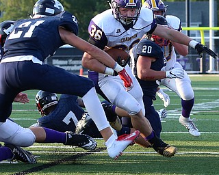 WAREEN, OHIO -August 25, 2018: CHAMPION FLASHES vs JOHN. F. KENNEDY EAGLES at Mollenkopf Stadium, Warren, OH-  Champion Flashes' Austin Willforth (36) rushes in for a TD as JFK Eagles' Nick Fordeley (21) defends during the 1st qtr.  MICHAEL G. TAYLOR | THE VINDICATOR