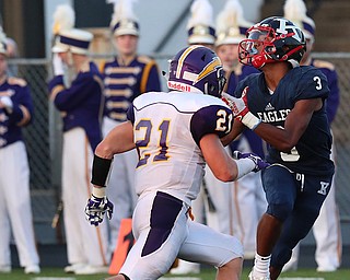 WAREEN, OHIO -August 25, 2018: CHAMPION FLASHES vs JOHN. F. KENNEDY EAGLES at Mollenkopf Stadium, Warren, OH-  JFK Eagles'  Savone Williamson (3) catches a td as Champion Flashes' Carter Mast (21) defends during the 2nd qtr.  MICHAEL G. TAYLOR | THE VINDICATOR