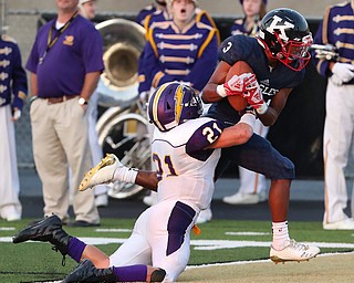 WAREEN, OHIO -August 25, 2018: CHAMPION FLASHES vs JOHN. F. KENNEDY EAGLES at Mollenkopf Stadium, Warren, OH-  JFK Eagles'  Savone Williamson (3) catches a td as Champion Flashes' Carter Mast (21) defends during the 2nd qtr.  MICHAEL G. TAYLOR | THE VINDICATOR