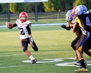 Campbell's Christian Stores runs with the ball during the first half of the game against Valley Christian Saturday night at Dave Pavlansky Field in Poland. EMILY MATTHEWS | THE VINDICATOR