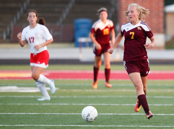 South Range's Addie Flowers runs down the field with the ball during Monday evening's game against Niles McKinley at South Range.