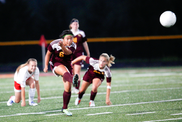 South Range's Marie DePascale kicks the ball downfield during the game against Niles McKinley Monday night at South Range.