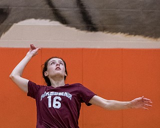 DIANNA OATRIDGE | THE VINDICATOR Boardman's Raegan Burkey serves the ball during their match against Howland. The Spartans won 3-0.