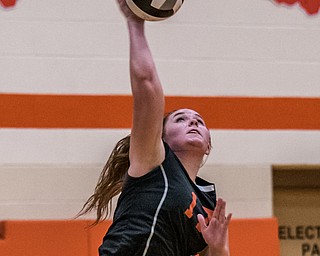 DIANNA OATRIDGE | THE VINDICATOR Howland's Haley Vandergrift jump serves during their match versus Boardman on Tuesday. The Spartans won 3-0.