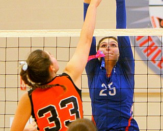 William D. Lewis The Vindicator Western Reserve's Danielle Vuletich(25) shoots past Springfield's Lyndsey Smith(33) duringh 8-30-18 asction at Western Reserve.