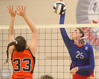 William D. Lewis The Vindicator Western Reserve's Danielle Vuletich(25) shoots past Springfield's Lyndsey Smith(33) duringh 8-30-18 asction at Western Reserve.