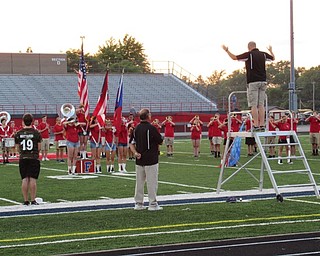 Neighbors | Jessica Harker.Band Director Wes O'Connor directed the band's performance of the National Anthem on Aug. 23 for Parent Preview Night.