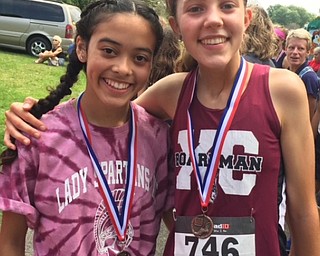 Neighbors | Submitted.Senior Sophia McGee placed sixth and sophomore Alayna Cuevas placed nineth overall at The Salem Early Bird Invitational.