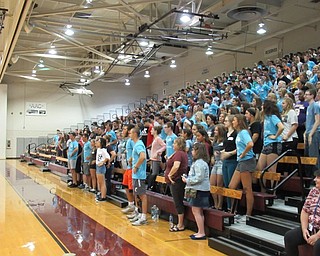 Neighbors | Jessica Harker .Incoming freshman at Boardman High School are joined by Link Leader students, who are juniors and seniors, to learn a new song and dance for freshman orientation.