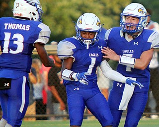 William D. Lewis The Vindicator  Hubbard's JayQuabOdem(1) gets congrats from Dean Thomas(13) and Cam Resatar(7) after intercepting a 1rst qtr pass during 8/31/18 action at Hubbard.
