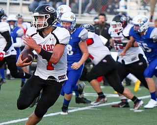 William D. Lewis The Vindicator  Girard's Mark Waid scrambles during the Aug. 31 game at Hubbard.