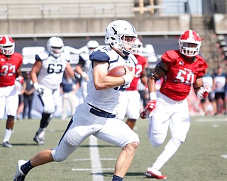 Butler's Will Marty runs with the ball during the first half of the game on Saturday.