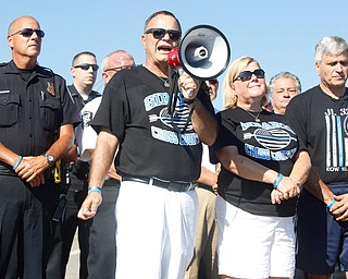 Dave Leo, Justin Leo's father, speaks at the dedication ceremony during which The Girard-McDonald viaduct was officially renamed the Officer Justin Leo Memorial Bridge on  Monday morning.