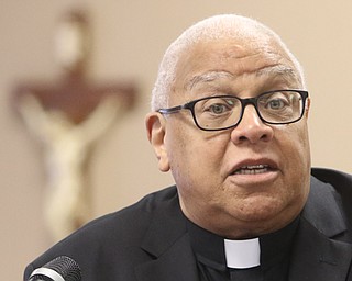 Bishop George V. Murry of the Catholic Diocese of Youngstown returned to work Tuesday after a bout with leukemia, and announced the diocese will publish on its website names of priests with credible sexual-abuse allegations against them.