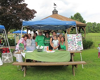 Neighbors | Jessica Harker.Members of the LAOH stood at their tent on Aug. 6 for the Heritage Day event at the Austintown Park.