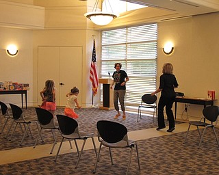 Neighbors | Jessica Harker.Librarians Nikki Puhalla and Lindsay Cramer danced with incoming Kindergarteners at the Aug. 8 Get Ready for Kindergarten event at the Austintown library.