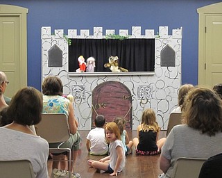 Neighbors | Jessica Harker .Boardman librarians acted out the story of "Little Red Riding Hood" with puppets August 8.