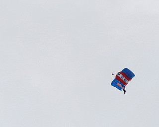 Jimmy Drummond, of Youngstown, skydives at the Austintown Patriot Day ceremony outside of Quaker Steak and Lube in Austintown on Thursday. EMILY MATTHEWS | THE VINDICATOR