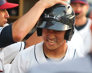 William D. Lewis The Vindicator Scrappers Steve Kwan(16) gets congratulated by teammates after scoring during 2nd inning during 9-6-18 game with TriCity