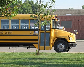 Neighbors | Jessica Harker.Busses dropped students off at Austintown Elementary School on Aug. 28 for the first day of school.