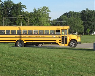 Neighbors | Jessica Harker.Busses dropped students off at Austintown Elementary School on Aug. 28 for the first day of school.