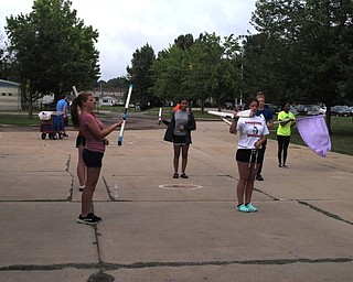 Neighbors | Jessica Harker.The Austintown band rifle line practiced outside of the school on Aug. 1 as part of the school's annual band camp.
