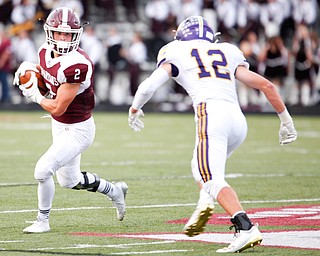 Boardman's Joe Ieraci tries to get past Jackson's Jake Ryan during the first half of their game Friday night at Boardman. EMILY MATTHEWS | THE VINDICATOR