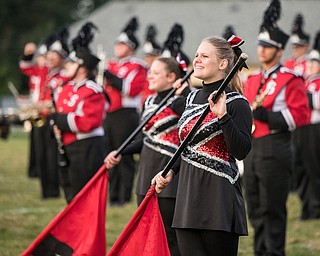 DiaNNA OATRIDGE | THE VINDICATOR Stuthers' flagline and band perform the pre-game cermonies prior to the Niles vs Struthers football game in Stuthers on Friday night.